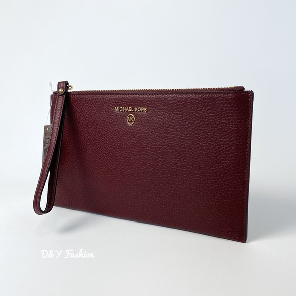Michael Kors Handbags - Michael Kors Jet Set Large Clutch Wristlet in Merlot